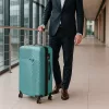 TraveLux Pro közepes bőrönd keményfedeles 68x45x25 cm lagúnakék